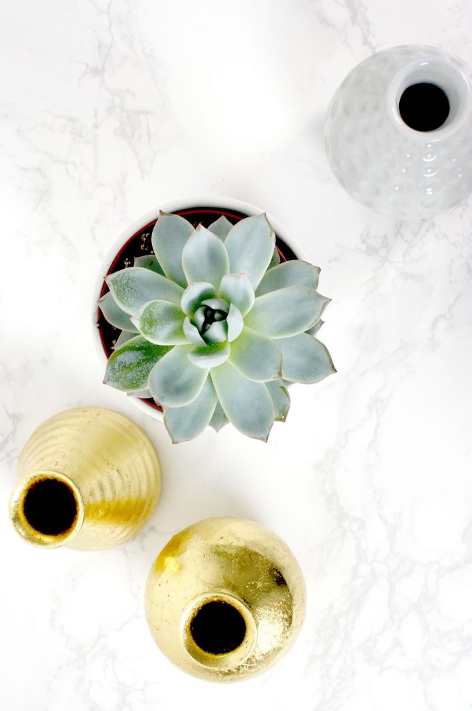 IKEA bud vases after gold leaf has been applied