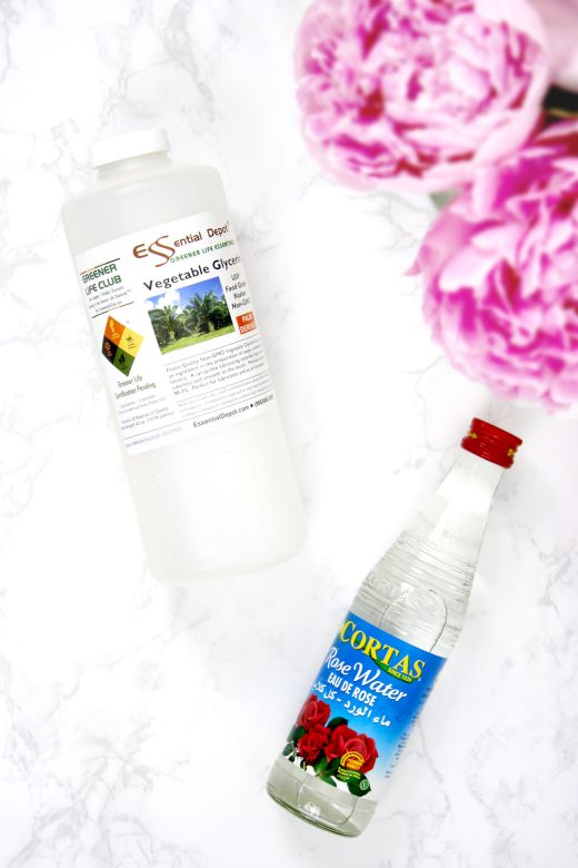 Bottles of vegetable glycerine and rosewater for making DIY setting spray