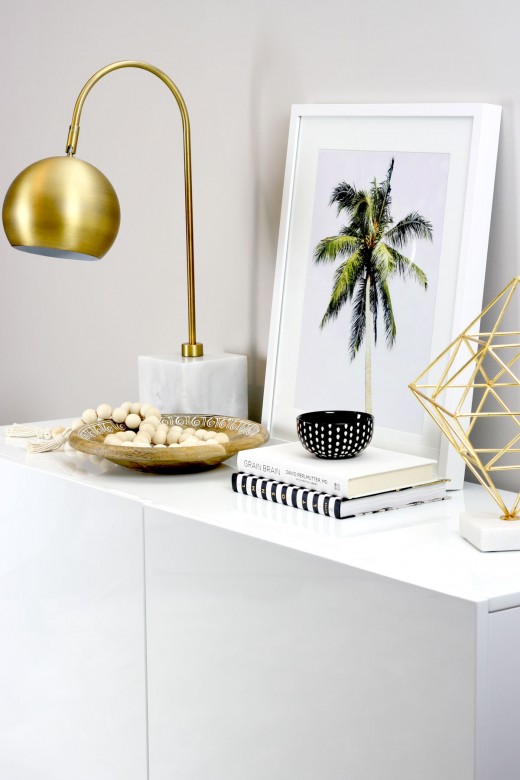 Learn to create DIY framed tropical prints to add a hint of the tropics to your living space. Includes FREE printable palm tree print. This inexpensive & easy home decor DIY will transport you to relaxing, serene summer days. Also includes styling ideas & picture frame recommendations. #DIY #DIYHome #DIYHomeDecor #DIYDecor #DIYArt