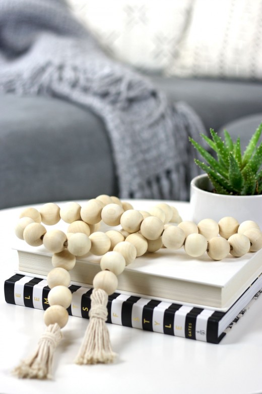 DIY wood bead garland styled on coffee table